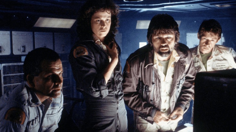 Ash, Ripley, Dallas, and Kane looking at monitor