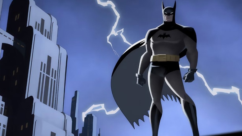 Batman: Caped Crusader, Batman standing on rooftop as lighting strikes