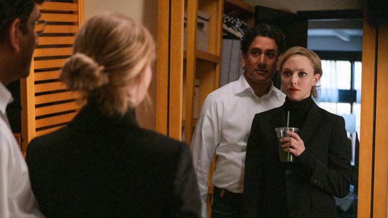 Naveen Andrews and Amanda Seyfried in The Dropout