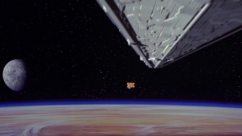 A star destroyer pursues a smaller craft in "A New Hope"