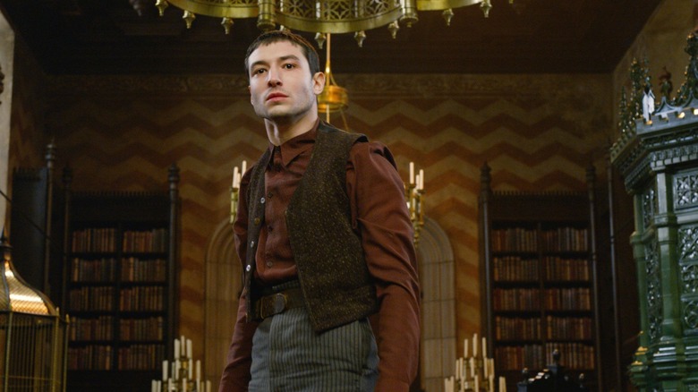 Ezra Miller as Credence