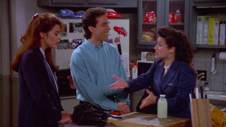 Julia Louis-Dreyfus como Elaine envergonha Jane Leeves como Marla e Jerry Seinfeld em Seinfeld