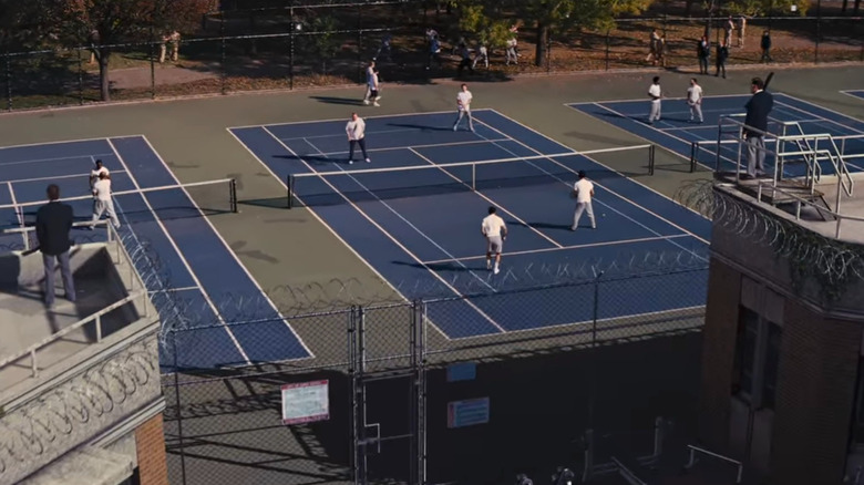 Prison inmates playing tennis