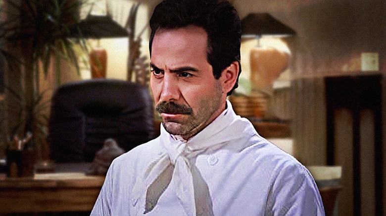 The Soup Nazi, played by Larry Thomas, stands scowling in Seinfeld