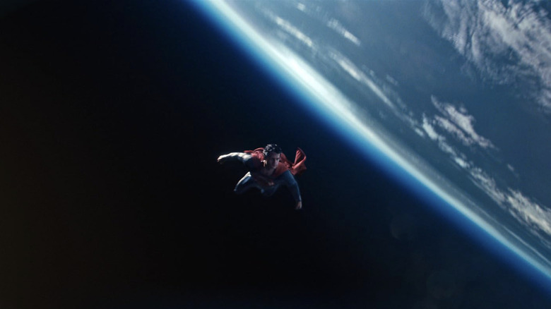 Man of Steel Superman flying Earth