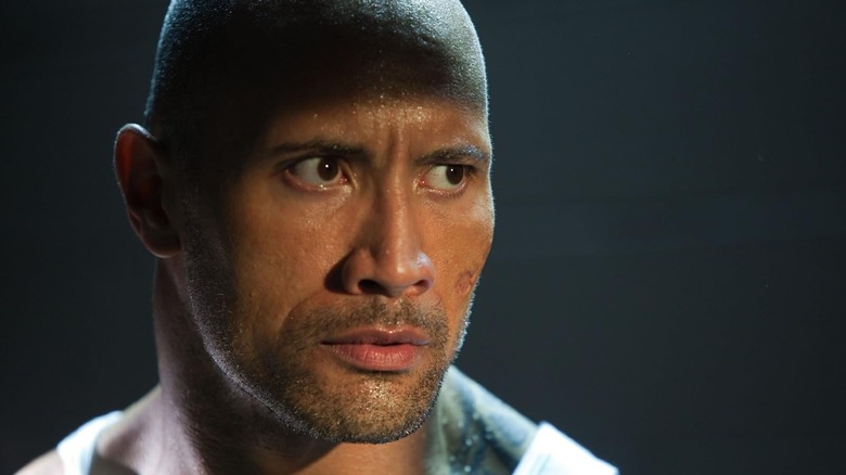 Dwayne Johnson as Jimmy Cullen staring intensely in Faster