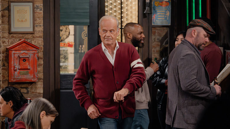 Kelsey Grammer's Frasier Crane enters Mahoneys bar in jaunty fashion in Frasier