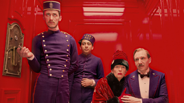 Tony Revolori, Tilda Swinton, and Ralph Fiennes in The Grand Budapest Hotel