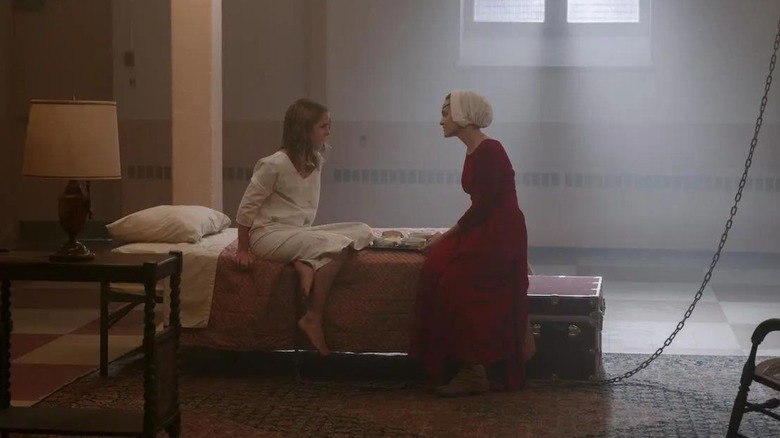 Mckenna Grace and Madeline Brewer as Esther and Janine in The Handmaid's Tale