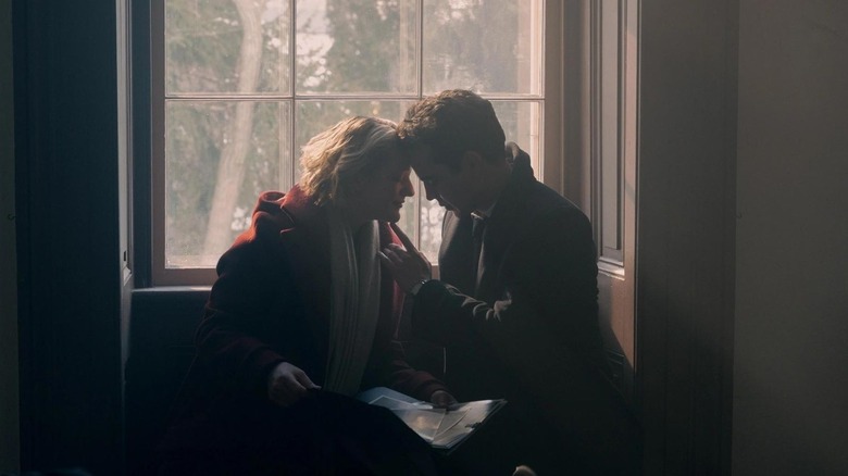 Elisabeth Moss as June and Max Minghella as Nick in The Handmaid's Tale