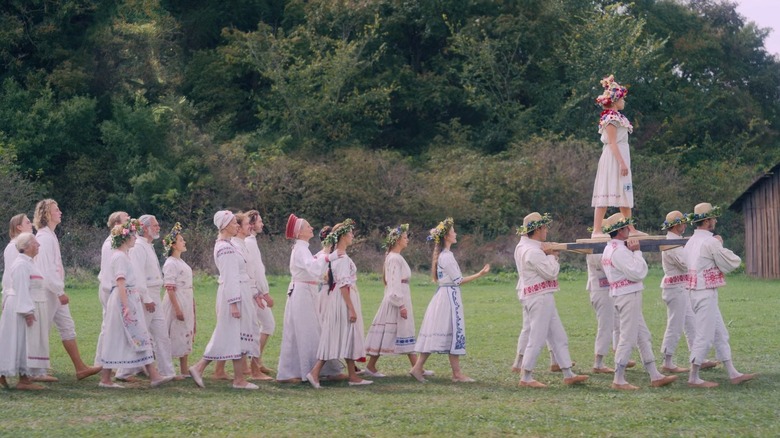 Florence Pugh and Ensemble in Midsommar