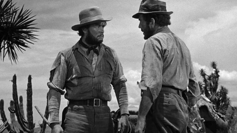 Fred and Bob having a conversation in The Treasure of the Sierra Madre