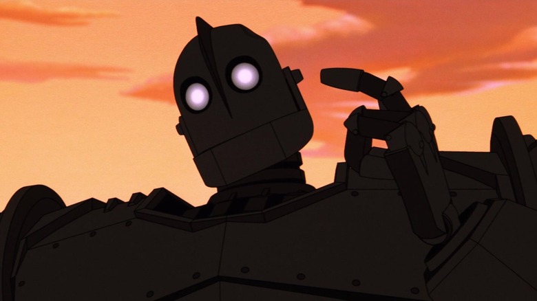 Iron Giant giant taps head with finger