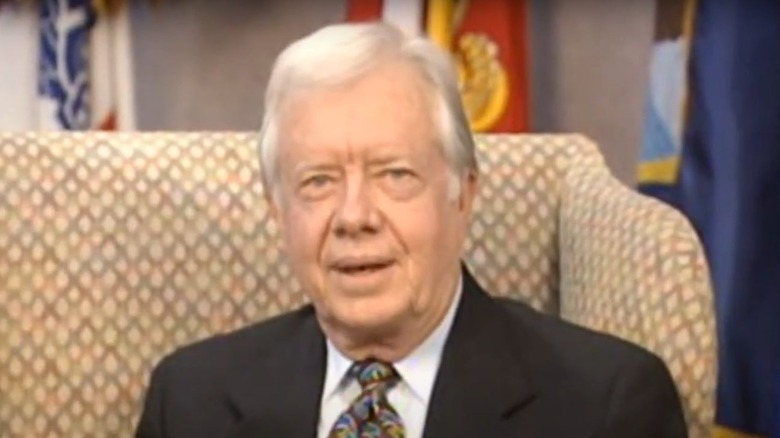 Jimmy Carter sitting in chair on Home Improvement