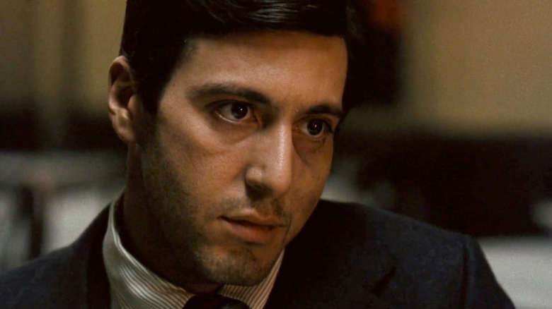 Al Pacino as Michael Corleone, looking intense with a broken jaw in The Godfather