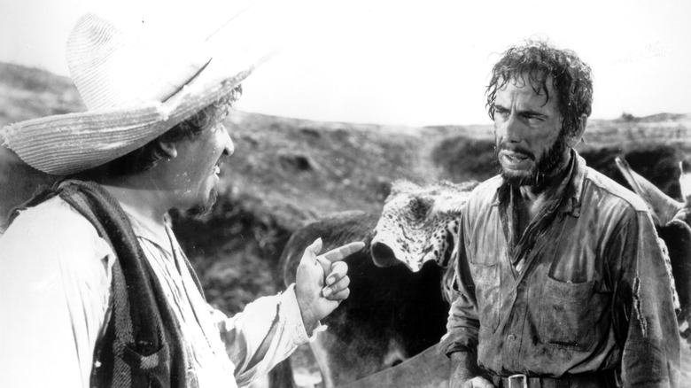 Humphrey Bogart argues with a local in The Treasure of the Sierra Madre (1948)