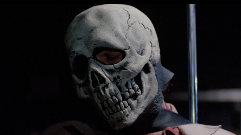 Tom Atkins as Dr. Challis in Halloween III: Season of the Witch