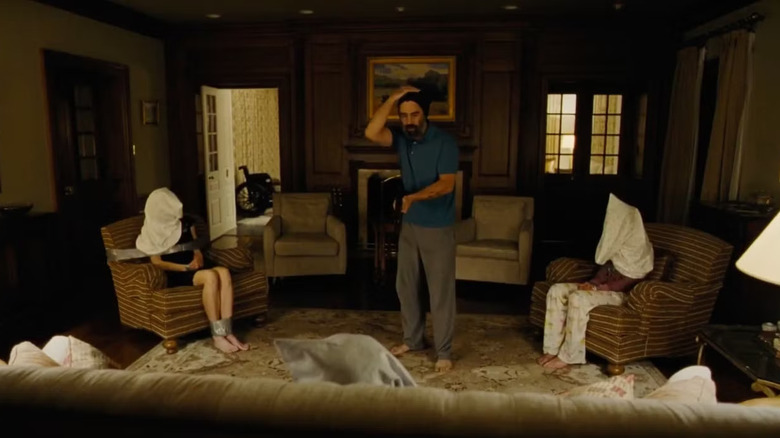 Colin Farrell as Steven surrounded by his restrained family in The Killing of a Sacred Deer