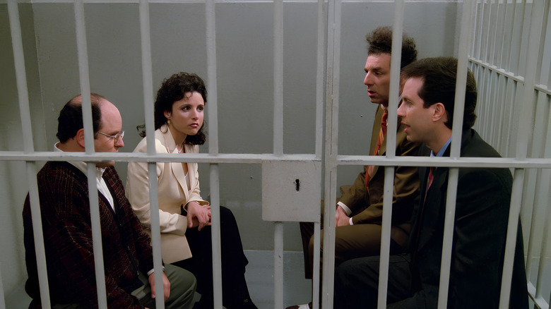 George, Elaine, Kramer and Jerryiers, who sit in a prison cell of Seinfeld.