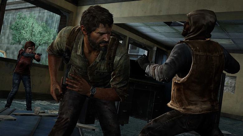 Joel and Ellie fight a hunter in The Last of Us video game