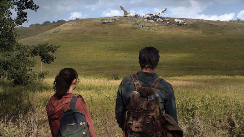 Joel and Ellie look upon the ruins of society in HBO's The Last of Us