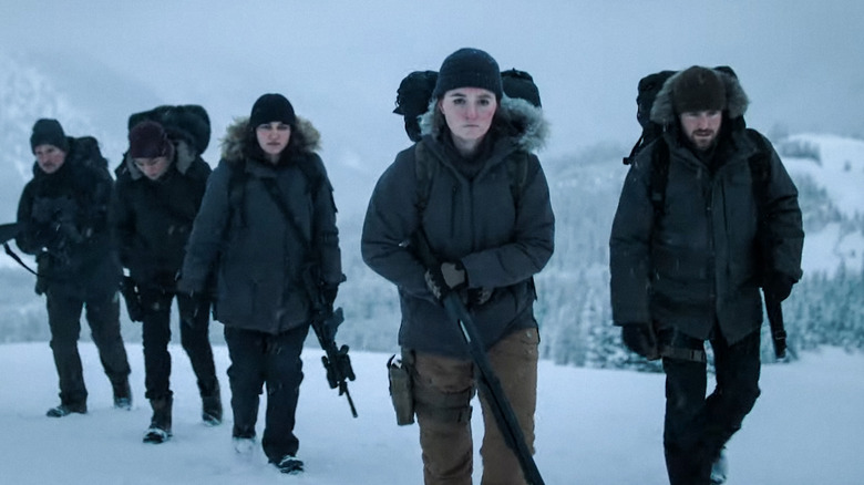 Abbie (Caitlin Dever) and her gang go through the snow