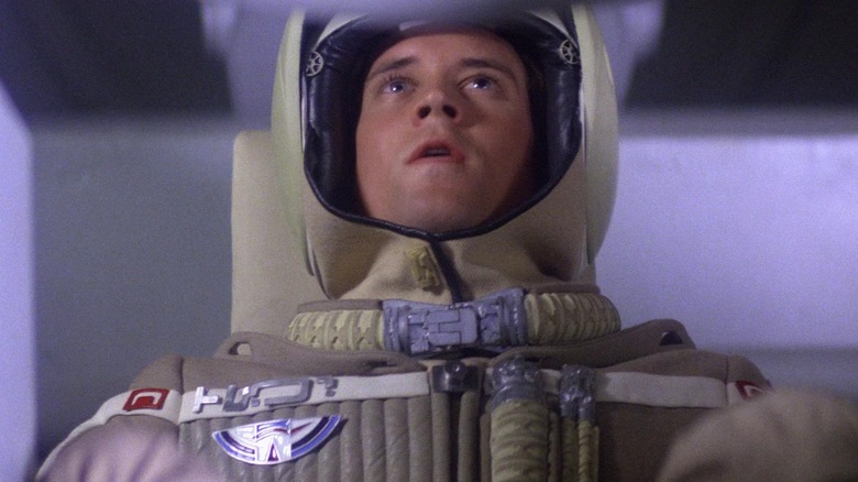 Lance Guest as Alex piloting a spacecraft in The Last Starfighter