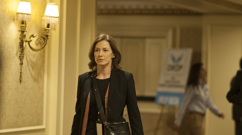 Nora (Carrie Coon) in a hotel hallway