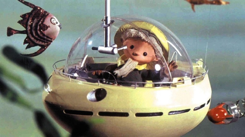 the little Sandman exploring the oceans in a bathyscaphe-type situation. From an episode of Unser Sandmännchen.