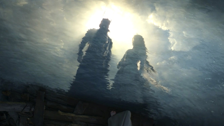 Sauron (Charlie Vickers) shows Galadriel (Morfydd Clark) their potential future in "The Lord of the Rings: The Rings of Power"