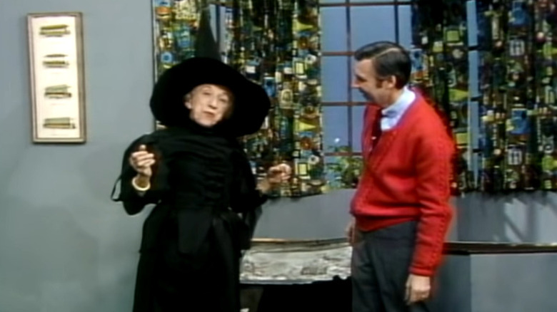 Margaret Hamilton dressed as the Wicked Witch next to Fred Rogers in Mister Rogers' Neighborhood