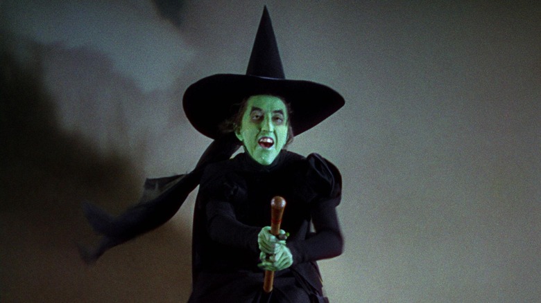 Margaret Hamilton riding her broomstick in The Wizard of Oz