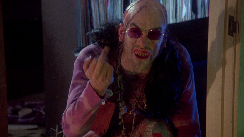 Chop Top from The Texas Chainsaw Massacre 2, flipping the bird