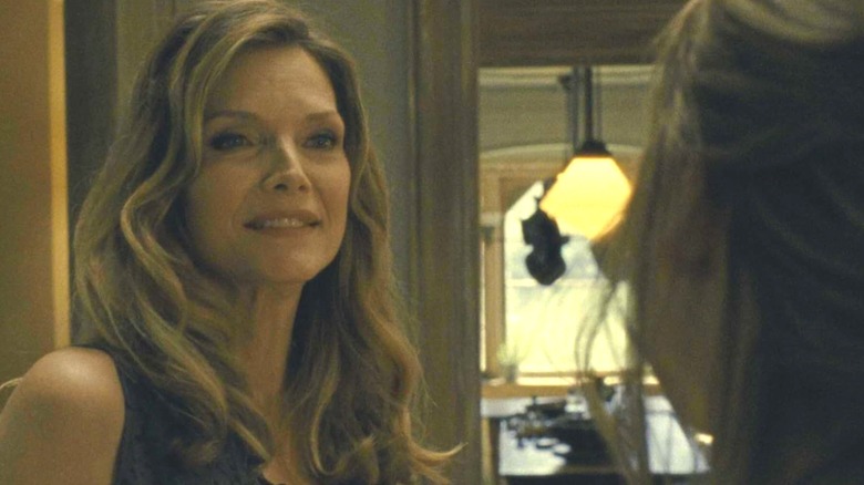 Michelle Pfeiffer's  Woman addresses someone offscreen in Mother!