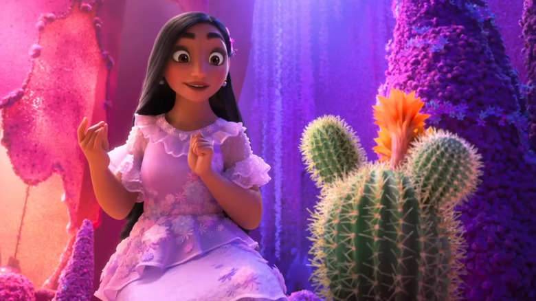 Isabella Madrigal admires a cactus she created in Encanto