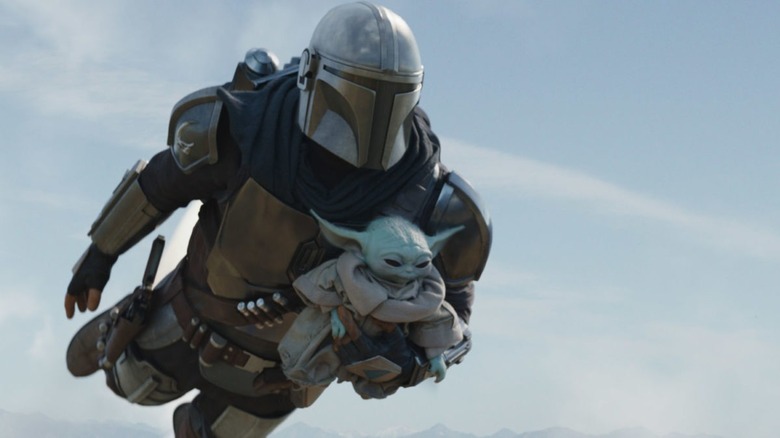 Din and Grogu flying in The Mandalorian 