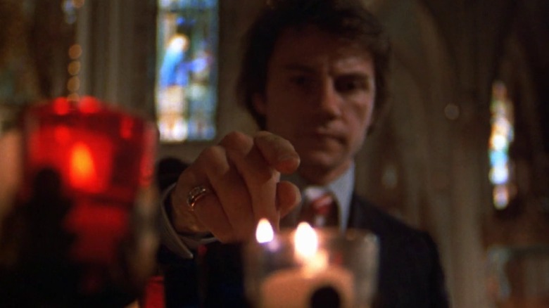 Harvey Keitel Mean Streets holding his finger above candle