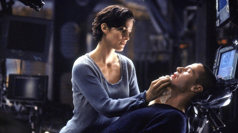 Keanu Reeves and Carrie-Anne Moss