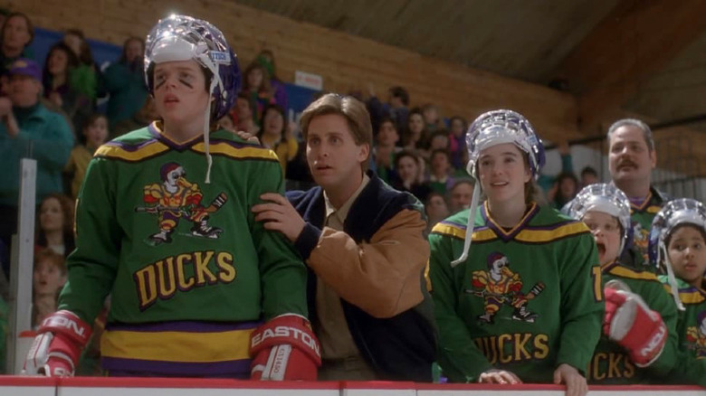 The Mighty Ducks watch the game from the bench