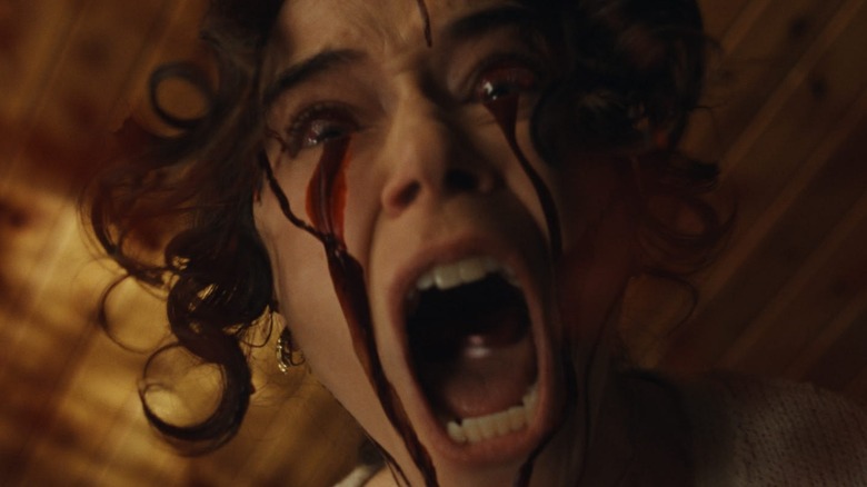 Lois Tatiana Masly screams with blood that jumped out of her eyes in the monkey