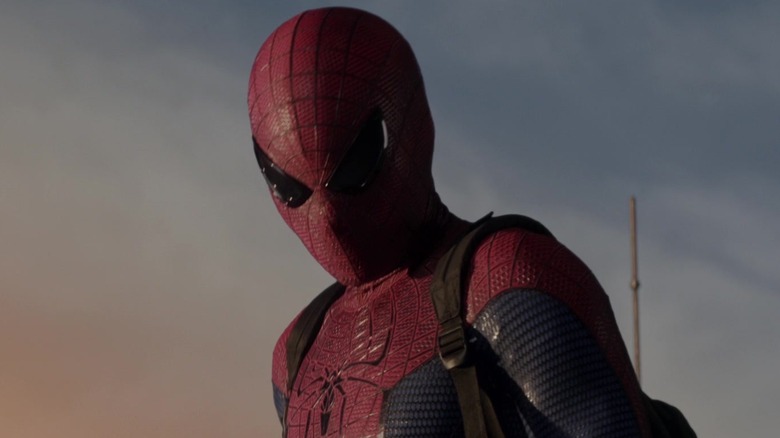 Andrew Garfield's Spider-Man standing on a rooftop in The Amazing Spider-Man