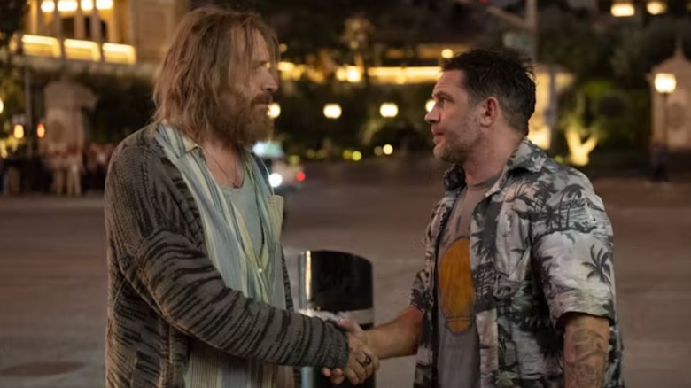 Rhys Ifans and Tom Hardy as Martin Moon and Eddie Brock, parting ways in Vegas in Venom: The Last Dance