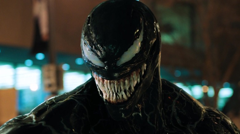 Tomy Hardy's Venom, grinning in the Venom movie