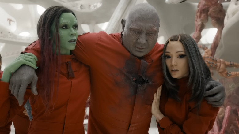 Gamora and Mantis carrying Drax