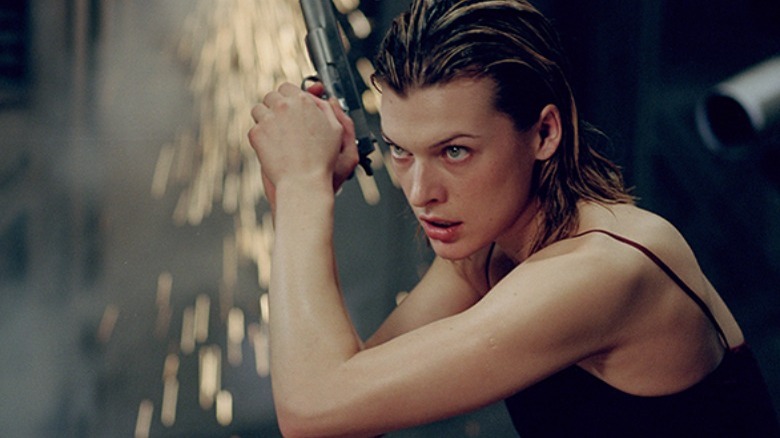 Milla Jovovich with gun