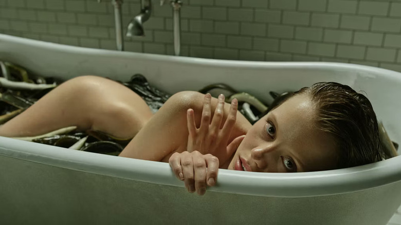 Mia Goth tub eels A Cure For Wellness