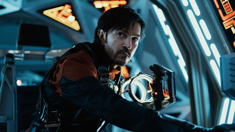 Diego Luna as Cassian Andor in the cockpit of a ship in Andor season 2