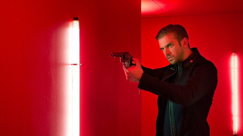 The Guest 2014 David points a gun