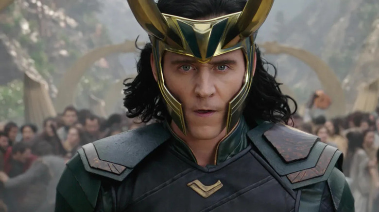 Tom Hiddleston as Loki wearing helmet