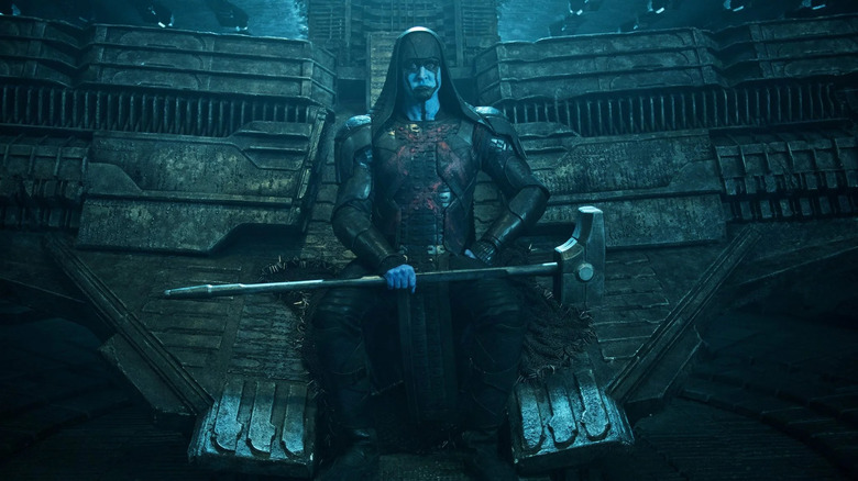 Lee Pace as Ronan the Accuser sitting on throne